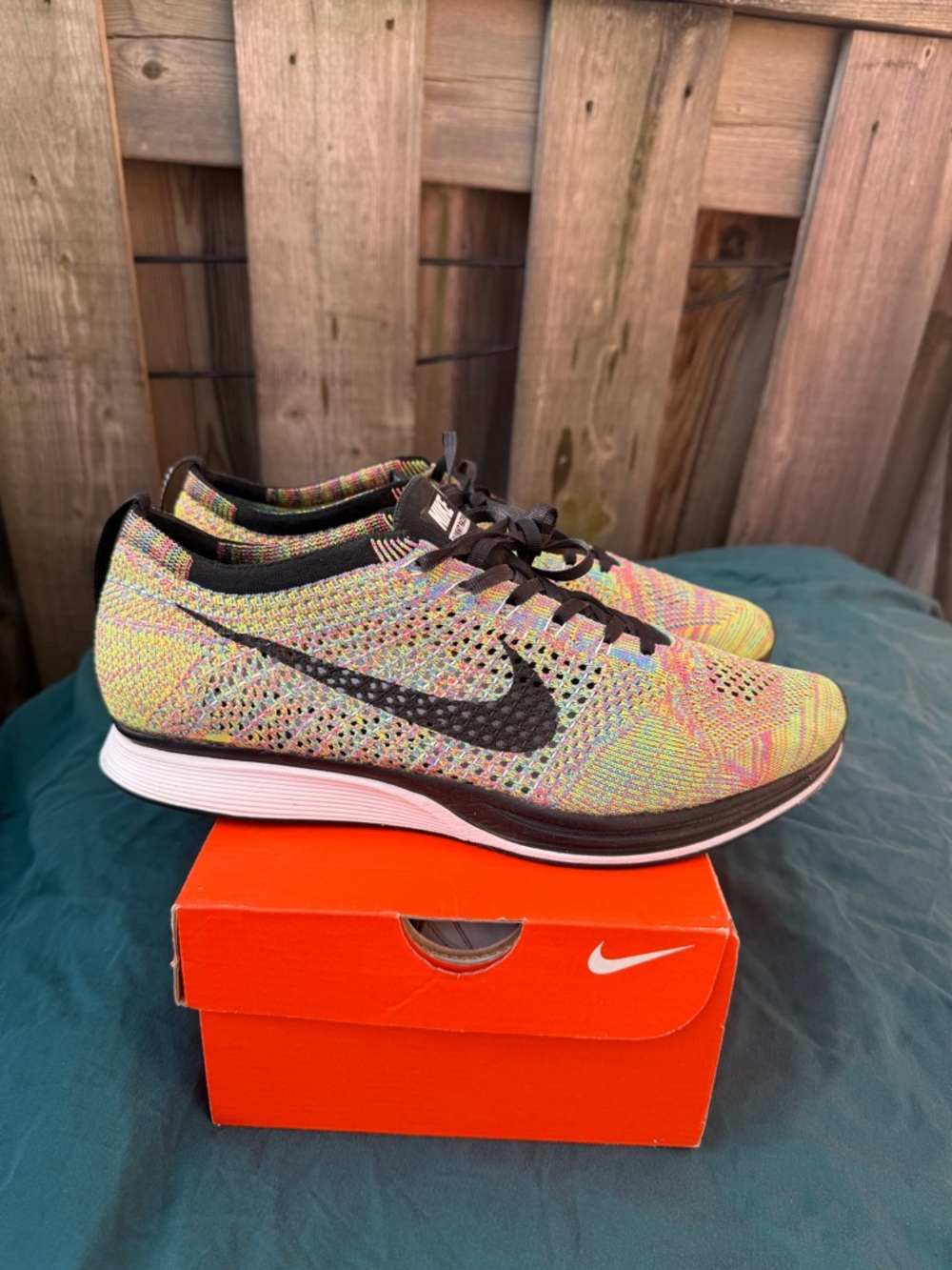 Nike Flyknit Racer Multi-Color 2.0
Size 12